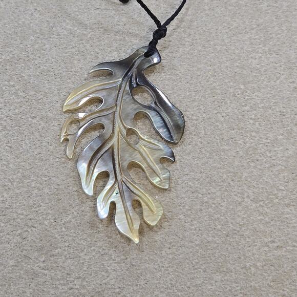 Carved Oyster Shell Hawaiian Monstera Pendant Delicate 17" Cord Necklace - Picture 6 of 11